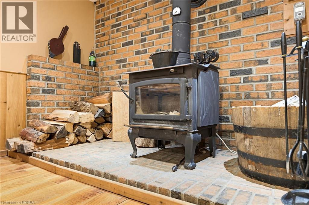 12 Mccammon Street, Paris, ON - Indoor With Fireplace