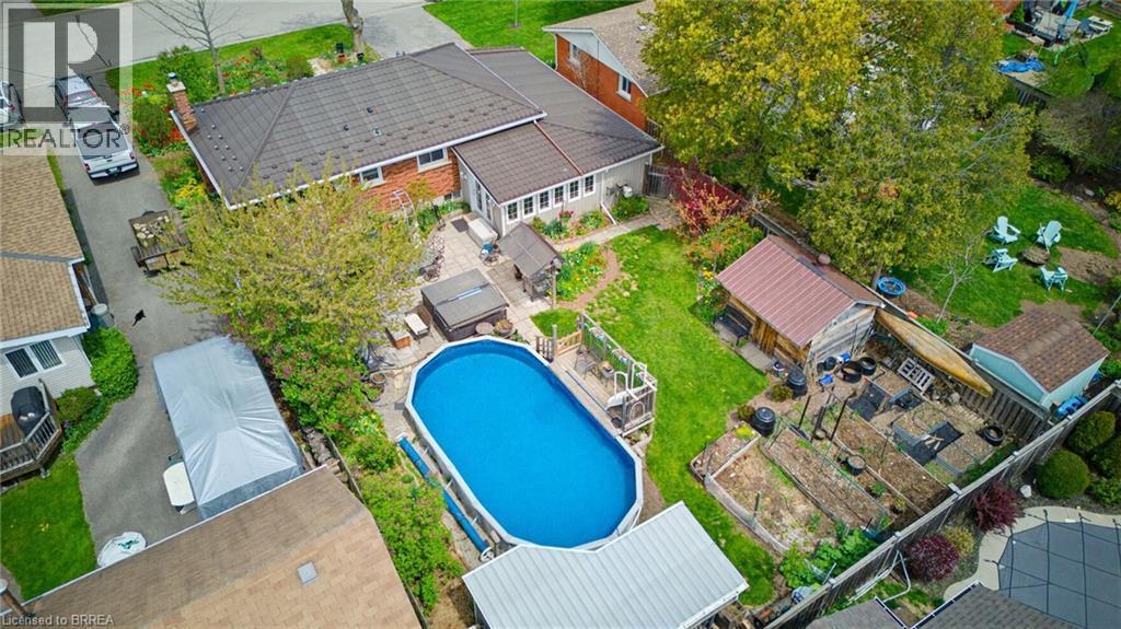 12 Mccammon Street, Paris, ON - Outdoor With Above Ground Pool