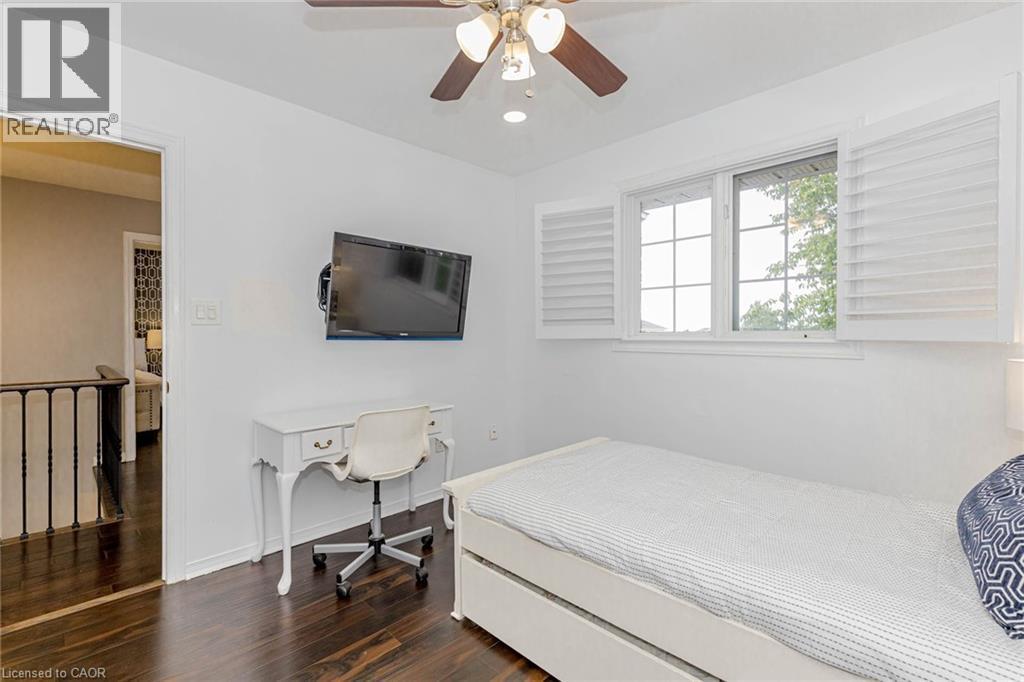 Bedroom with dark wood-type flooring, a ceiling fan, and recessed lighting - 32 Vineberg Drive, Hamilton, ON - Indoor Photo Showing Bedroom
