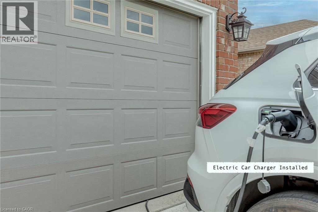 View of garage - 32 Vineberg Drive, Hamilton, ON - Photo Showing Laundry Room