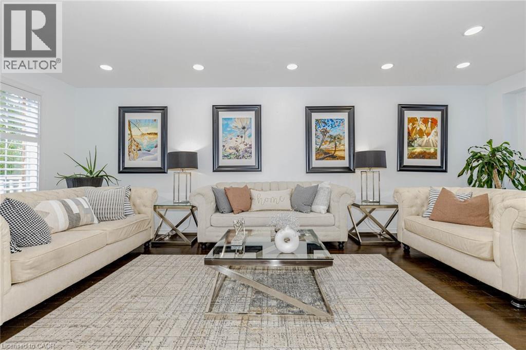 Living area featuring recessed lighting and dark wood-type flooring - 32 Vineberg Drive, Hamilton, ON - Indoor Photo Showing Living Room