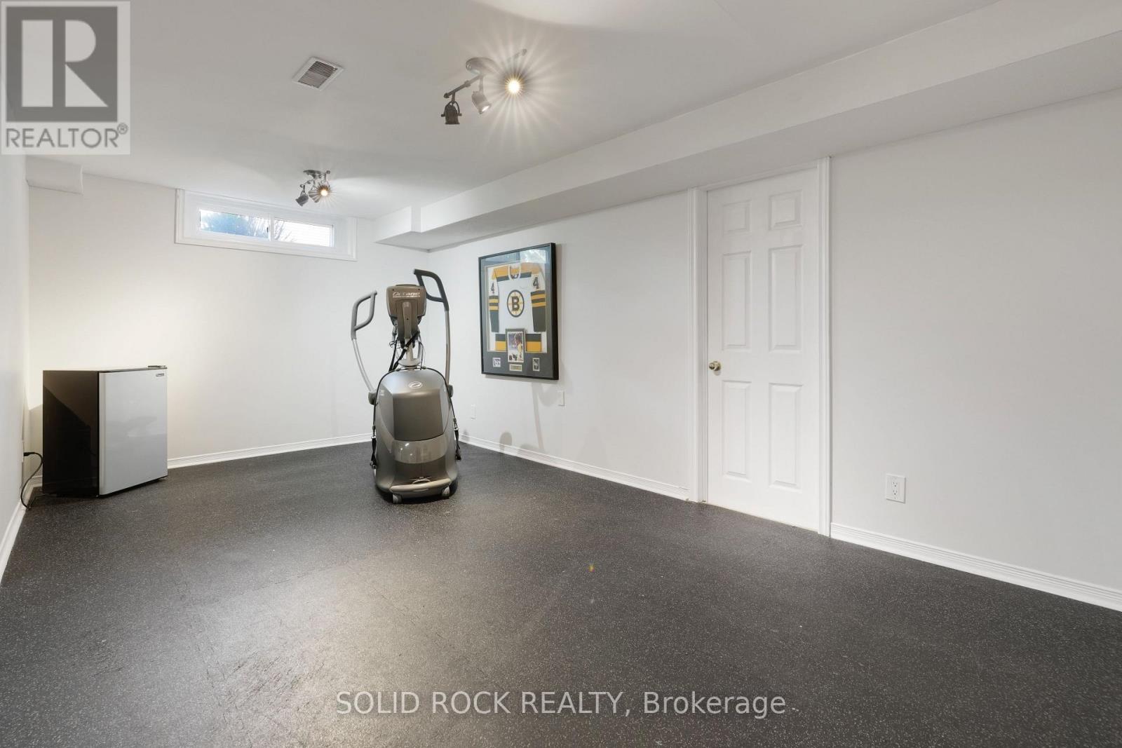 Basement - Workout area with rubber workout mat - 41 Framingham Crescent, Ottawa, ON - Indoor Photo Showing Other Room