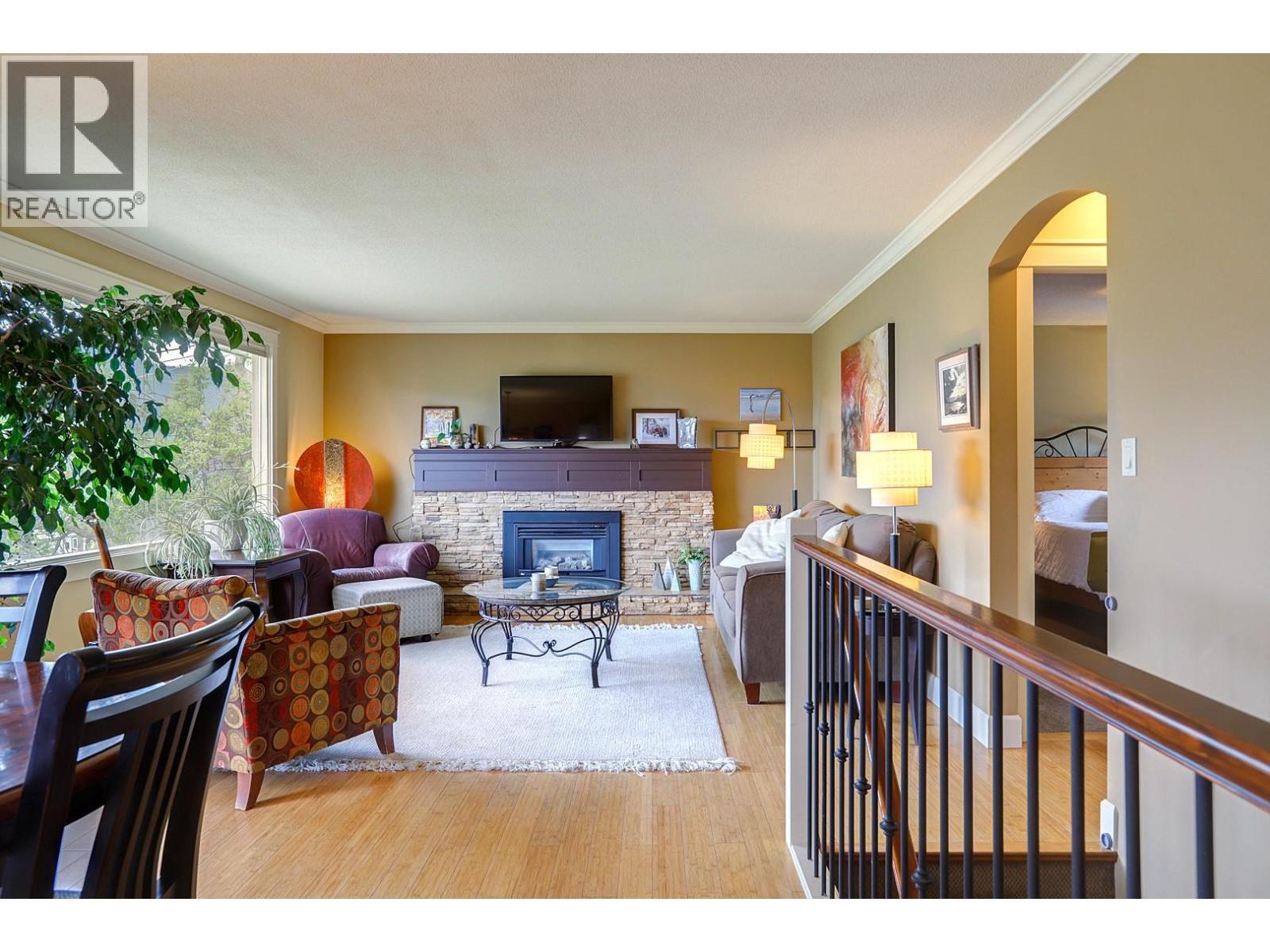 8308 Kalview Drive, Coldstream, BC - Indoor Photo Showing Living Room With Fireplace