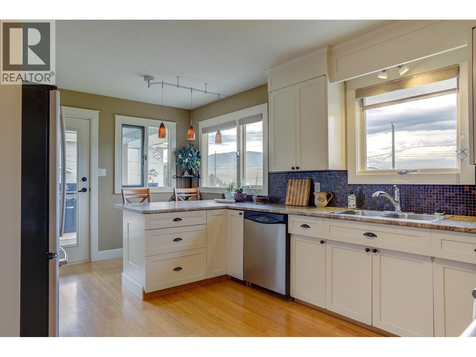 8308 Kalview Drive, Coldstream, BC - Indoor Photo Showing Kitchen With Double Sink