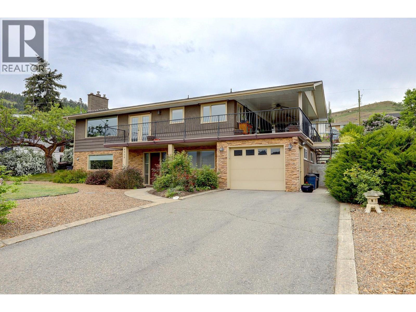 8308 Kalview Drive, Coldstream, BC - Outdoor With Facade