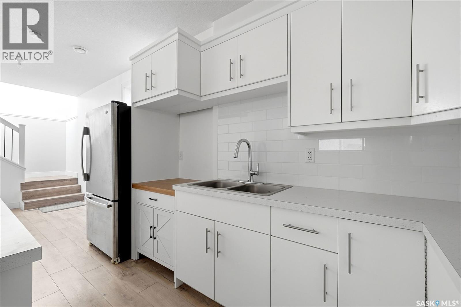 2100 Queen Street, Regina, SK - Indoor Photo Showing Kitchen With Double Sink