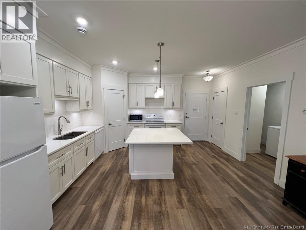 54 Hampton Road Unit# 206, Rothesay, NB - Indoor Photo Showing Kitchen With Double Sink