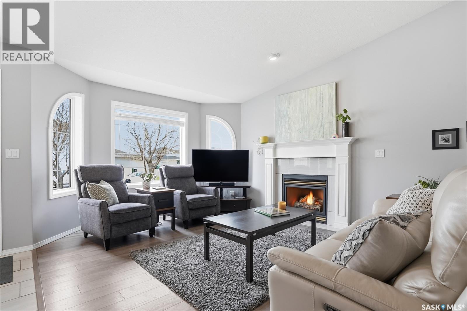 523 Pobran Crescent, Saskatoon, SK - Indoor Photo Showing Living Room With Fireplace