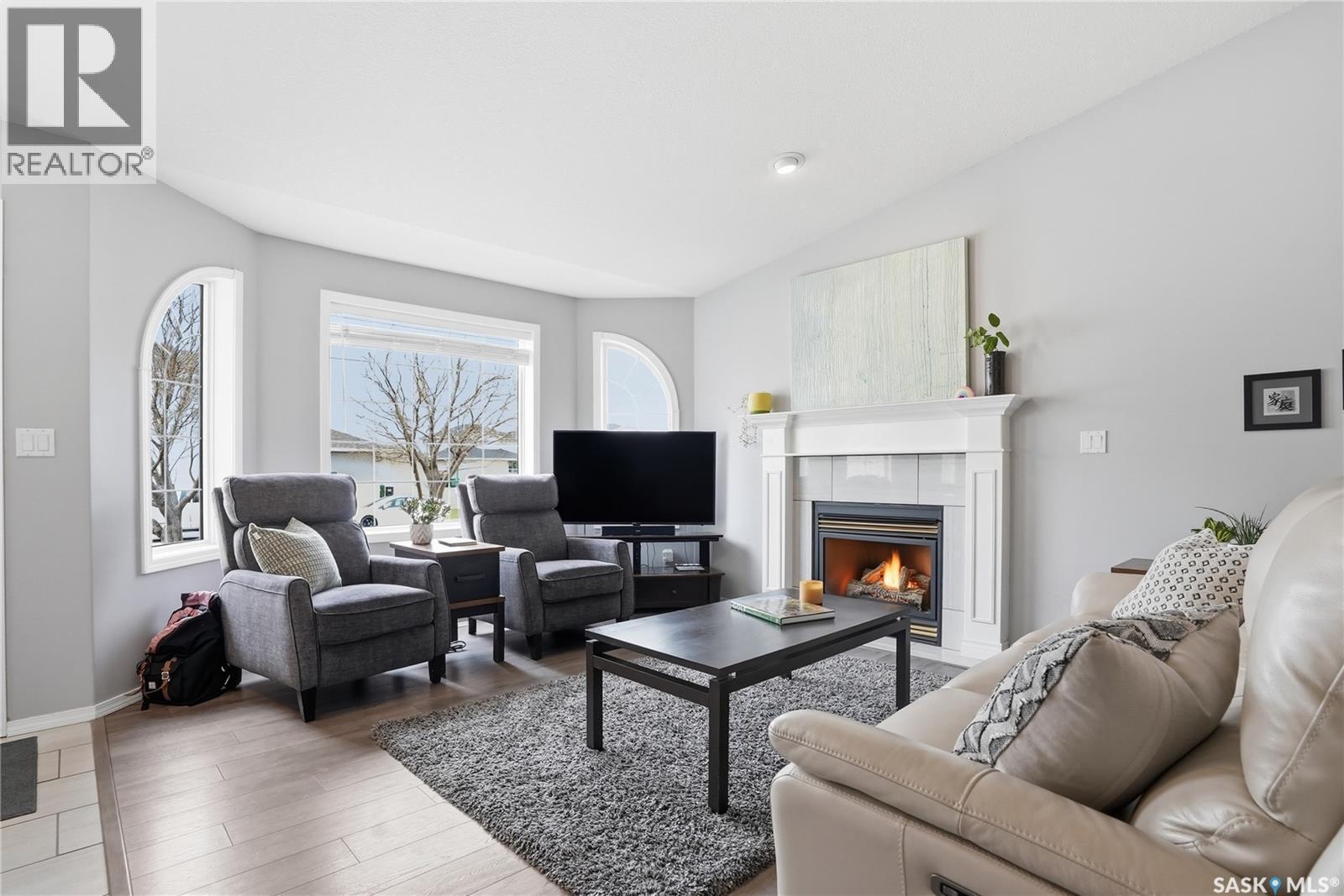 523 Pobran Crescent, Saskatoon, SK - Indoor Photo Showing Living Room With Fireplace