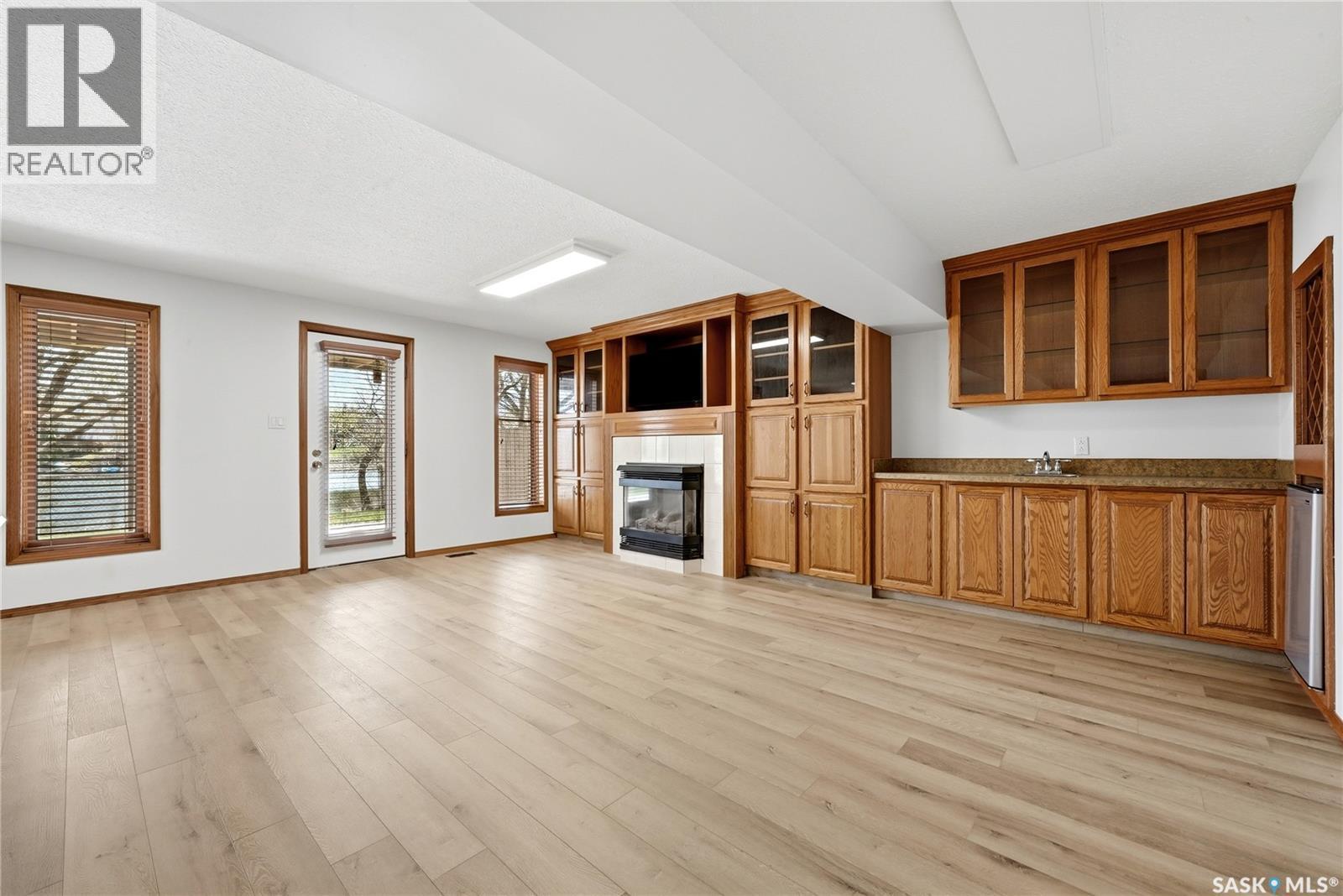 1535 Lee Grayson Crescent N, Regina, SK - Indoor With Fireplace