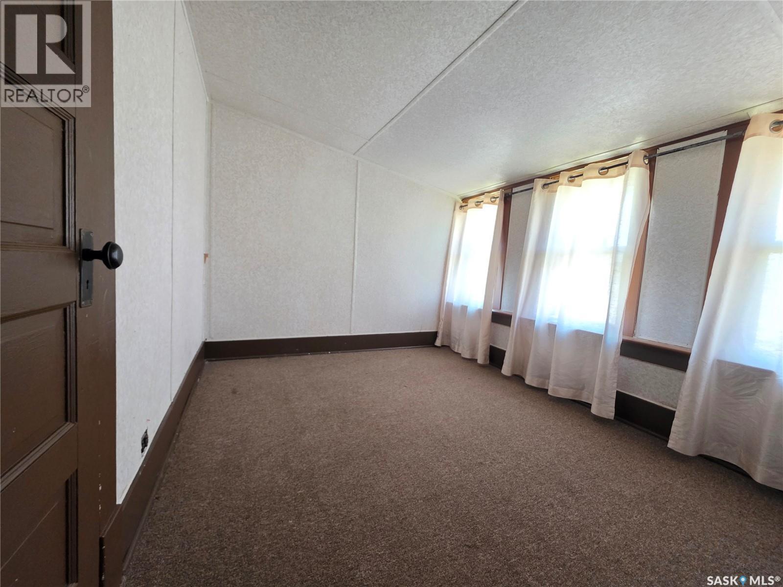 111 Warwick Street, Neville, SK - Indoor Photo Showing Other Room