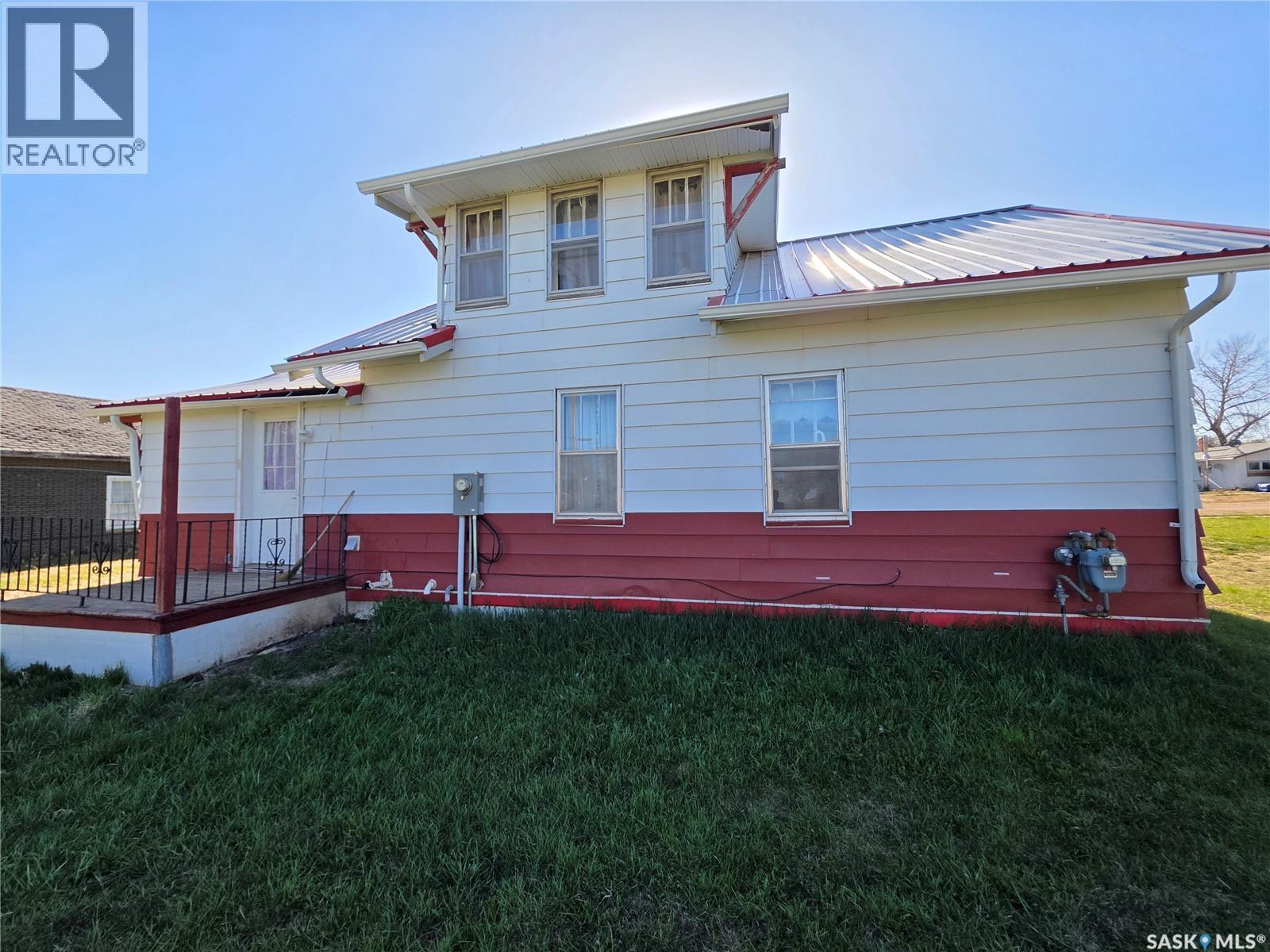 111 Warwick Street, Neville, SK - Outdoor With Deck Patio Veranda With Exterior