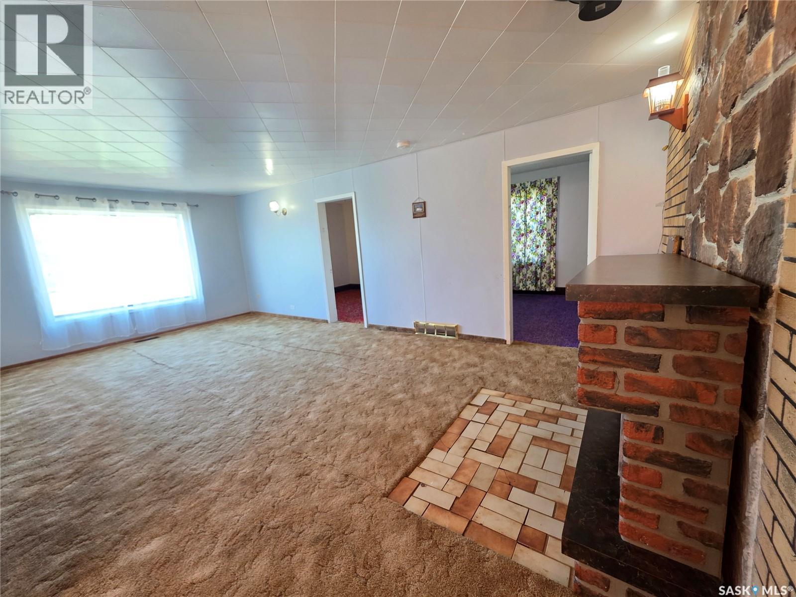 111 Warwick Street, Neville, SK - Indoor Photo Showing Other Room