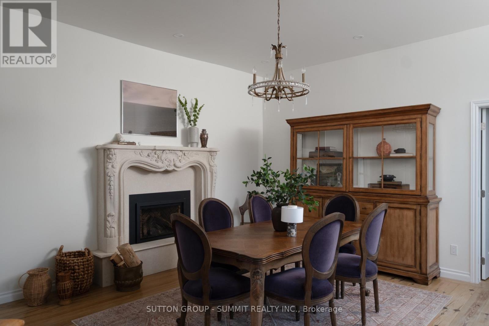 1198 Tiny Beaches Road N, Tiny, ON - Indoor Photo Showing Dining Room With Fireplace