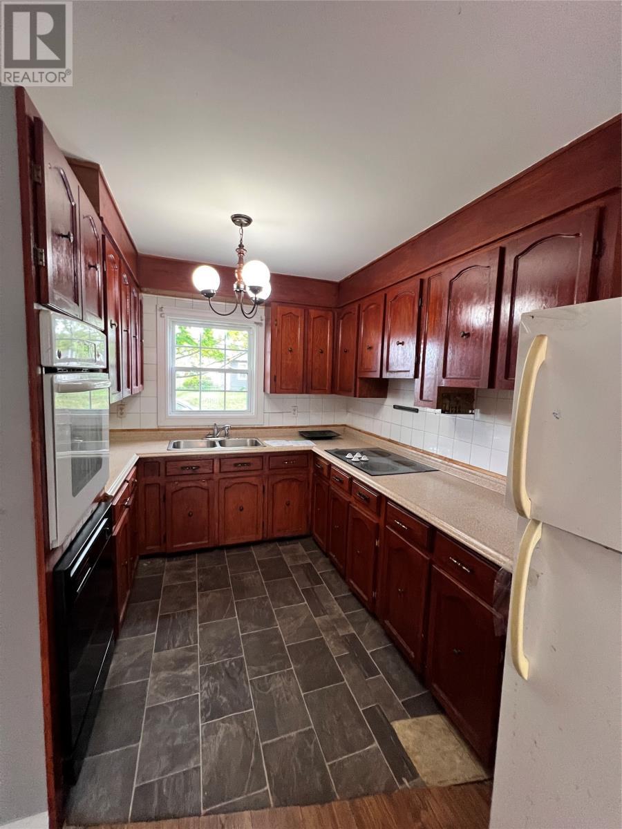 4 Morley Drive, Placentia, NL - Indoor Photo Showing Kitchen With Double Sink