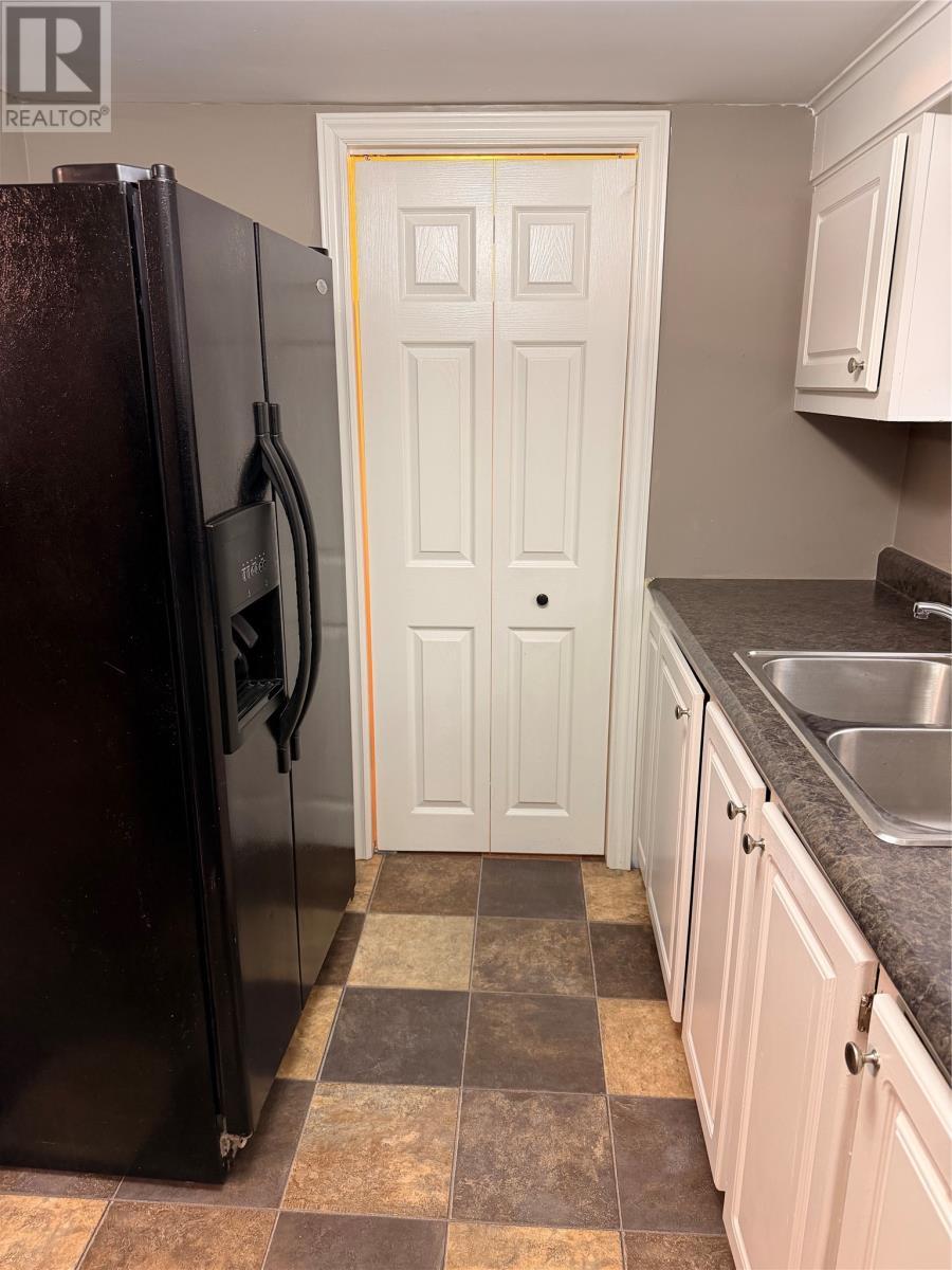55 Conception Bay Highway, Conception Harbour, NL - Indoor Photo Showing Kitchen With Double Sink