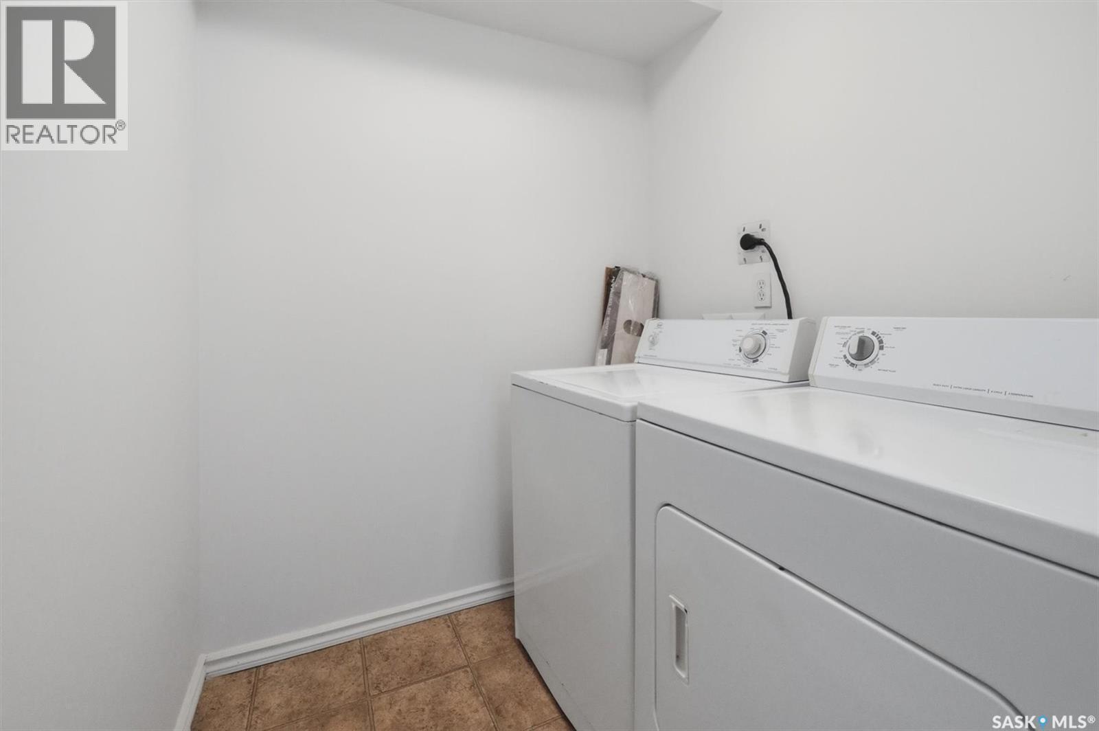104 2233 St Henry Avenue, Saskatoon, SK - Indoor Photo Showing Laundry Room