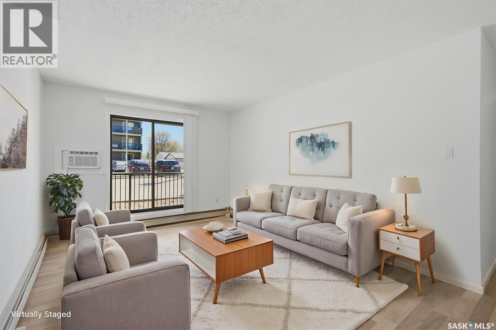 104 2233 St Henry Avenue, Saskatoon, SK - Indoor Photo Showing Living Room