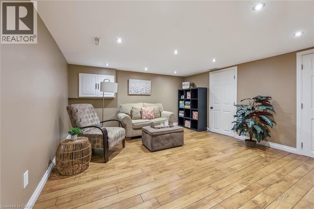 Recessed lighting, wood-finish flooring, white trim, and white paneled doors - 460 Parkview Crescent, Cambridge, ON - Indoor