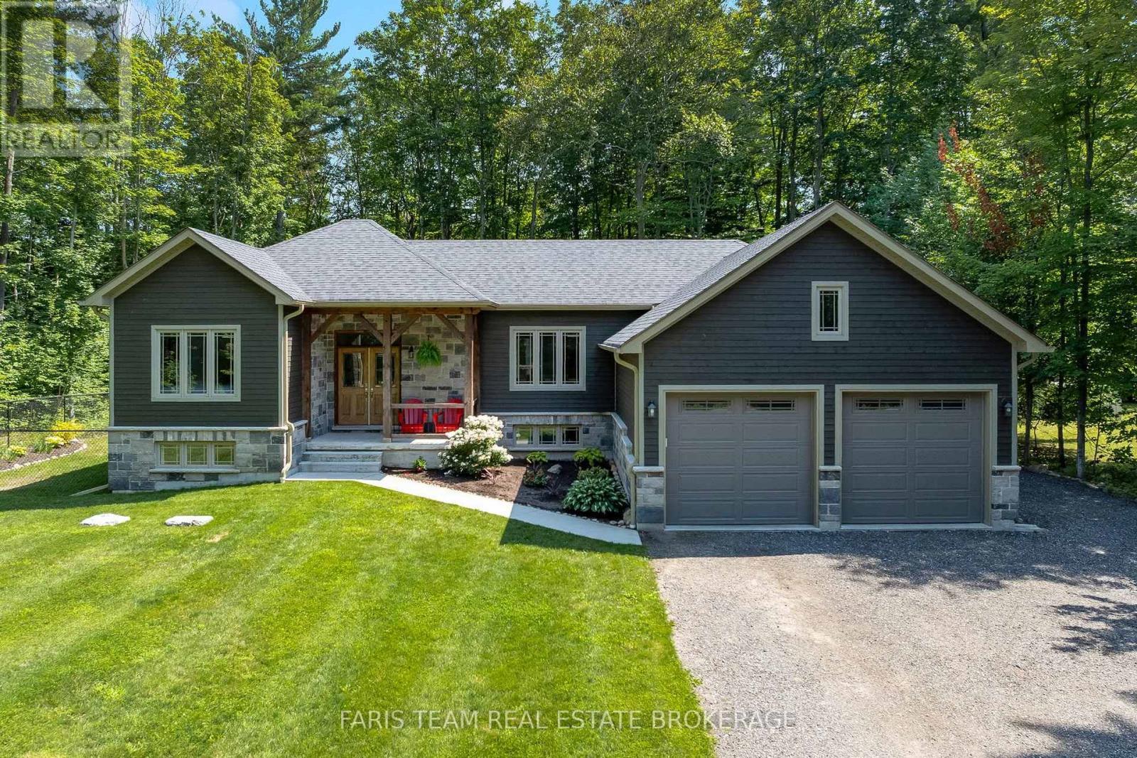 41 Tall Pines Drive, Tiny, ON - Outdoor With Deck Patio Veranda With Facade