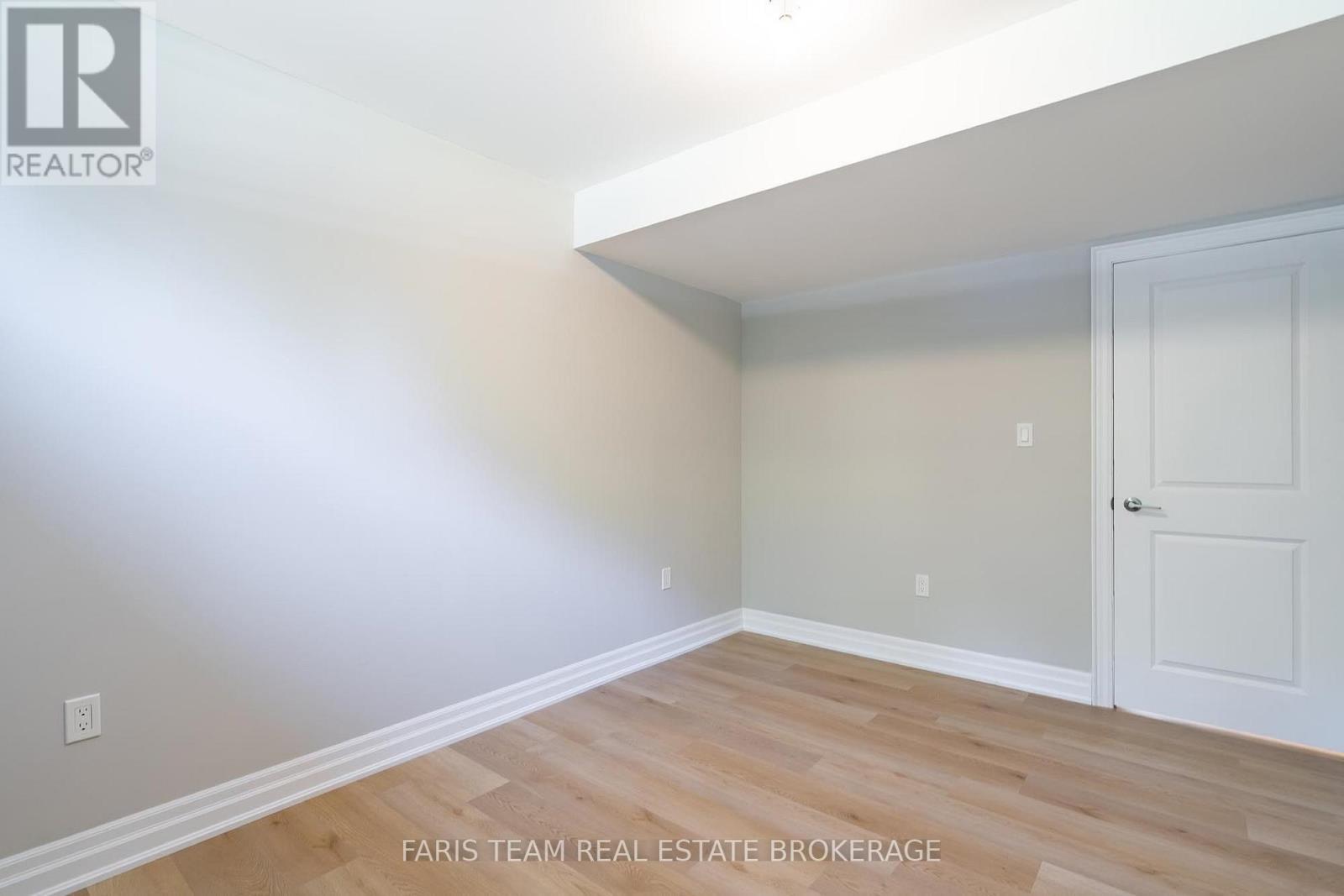 41 Tall Pines Drive, Tiny, ON - Indoor Photo Showing Other Room