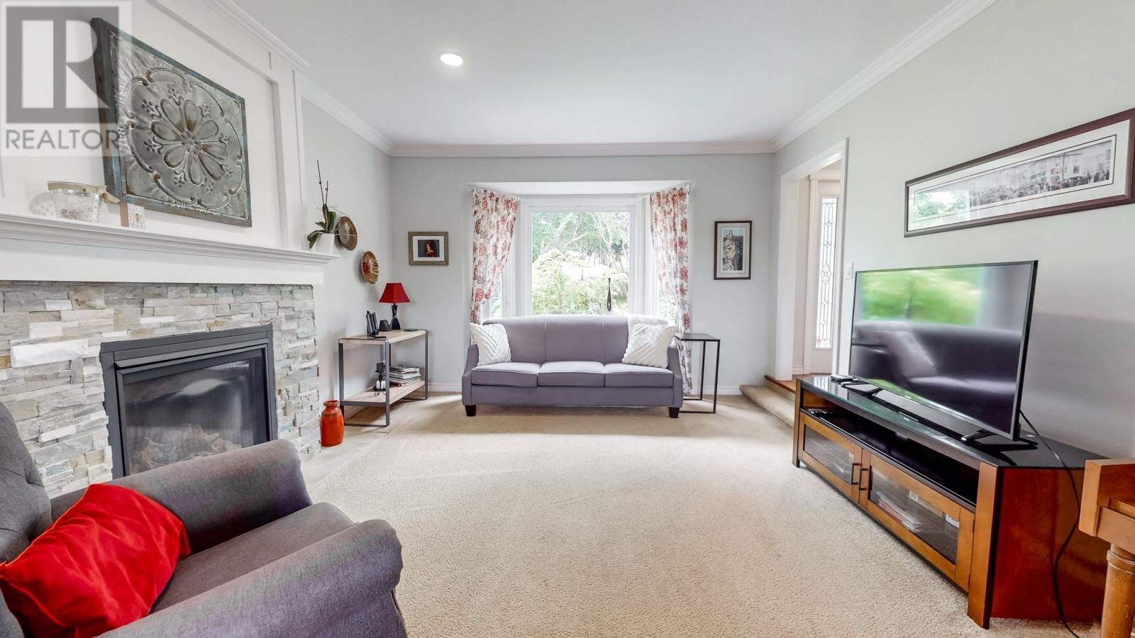 45 Motion Lane, Torbay, NL - Indoor Photo Showing Living Room With Fireplace