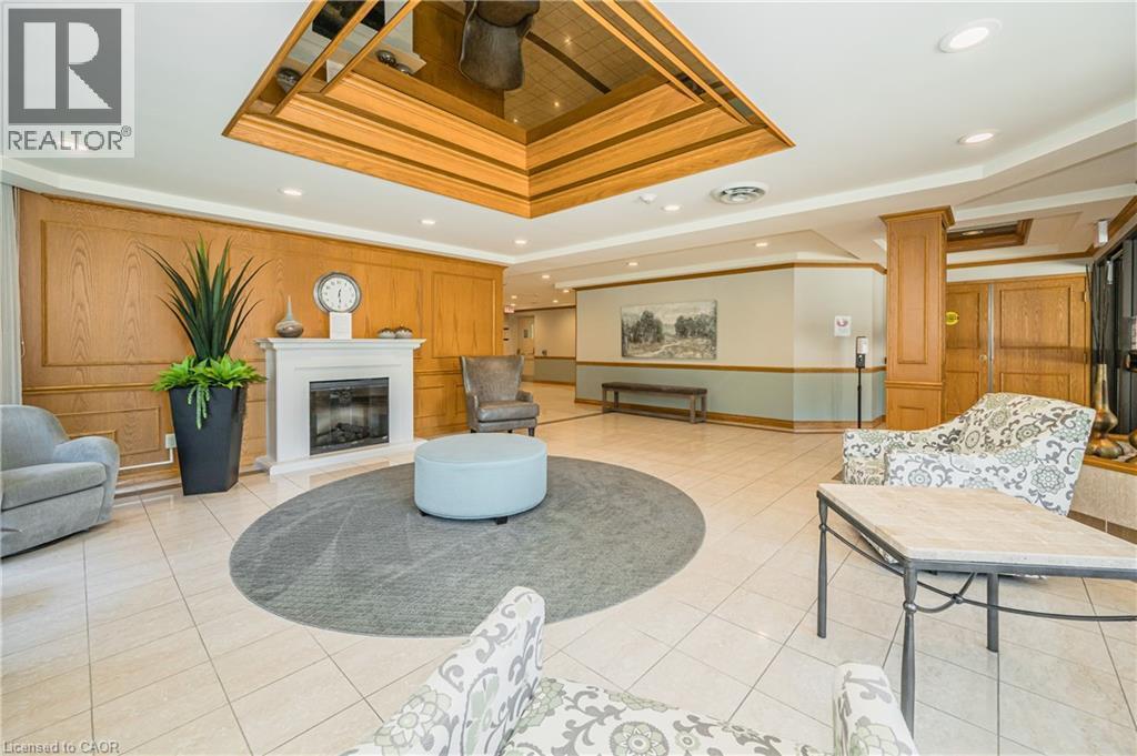 6 Willow Street Unit# 802, Waterloo, ON - Indoor With Fireplace
