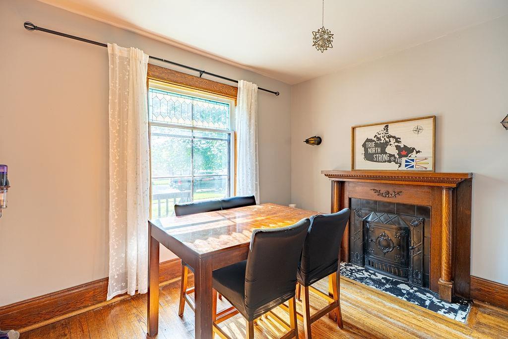 637 Catherine St., Thunder Bay, ON - Indoor Photo Showing Dining Room With Fireplace