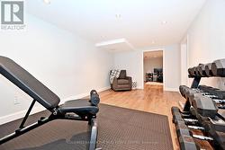 recreation room -pot lights and laminate floors - 