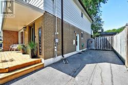 driveway extends past side entrance - 