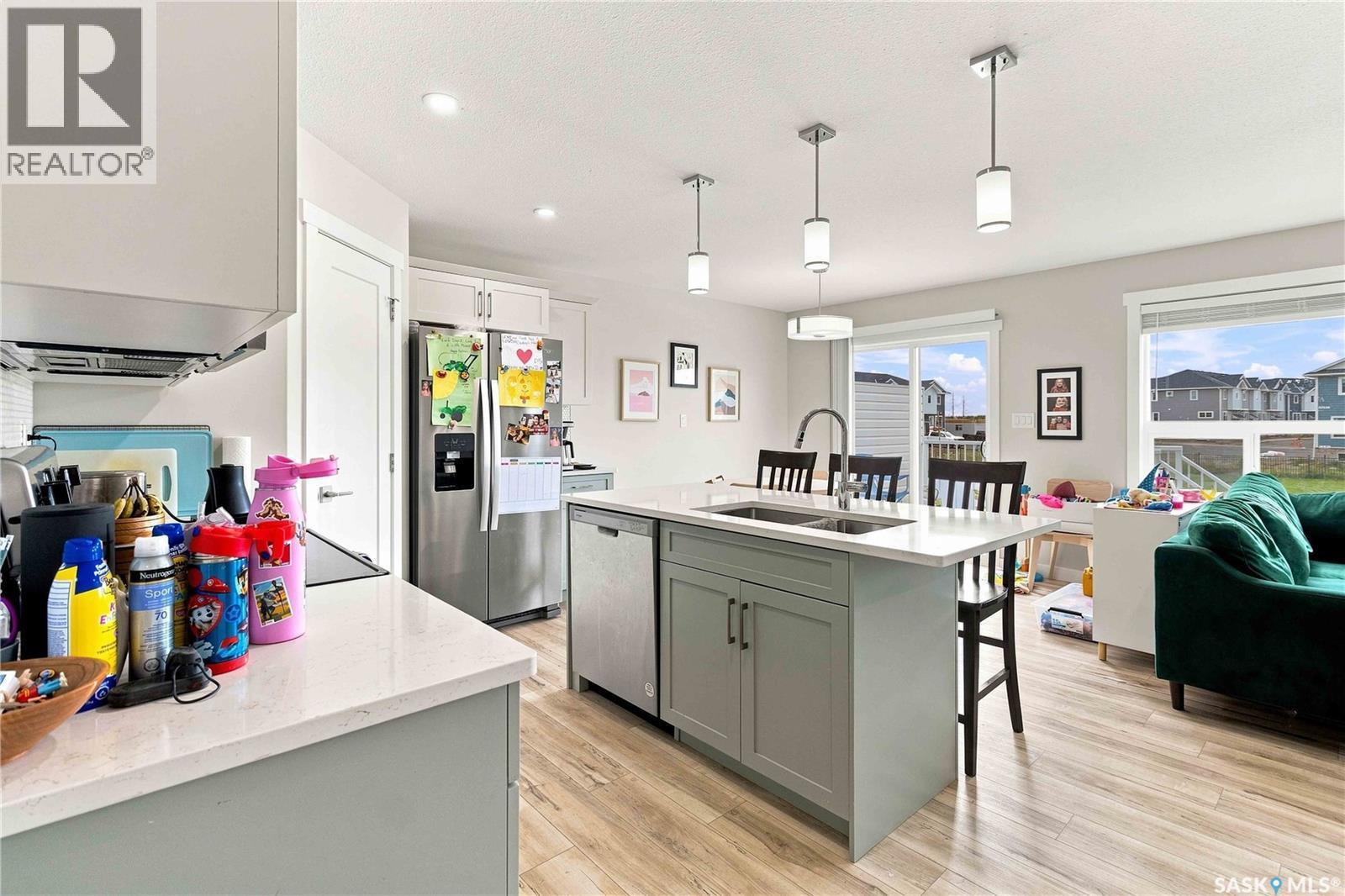 422 Myles Heidt Manor, Saskatoon, SK - Indoor Photo Showing Kitchen With Double Sink