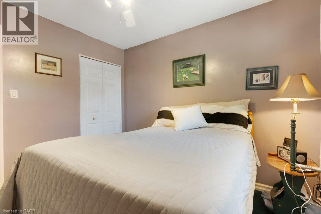 White ceiling fan with integrated lighting - 236 Winston Boulevard, Cambridge, ON - Indoor Photo Showing Bedroom