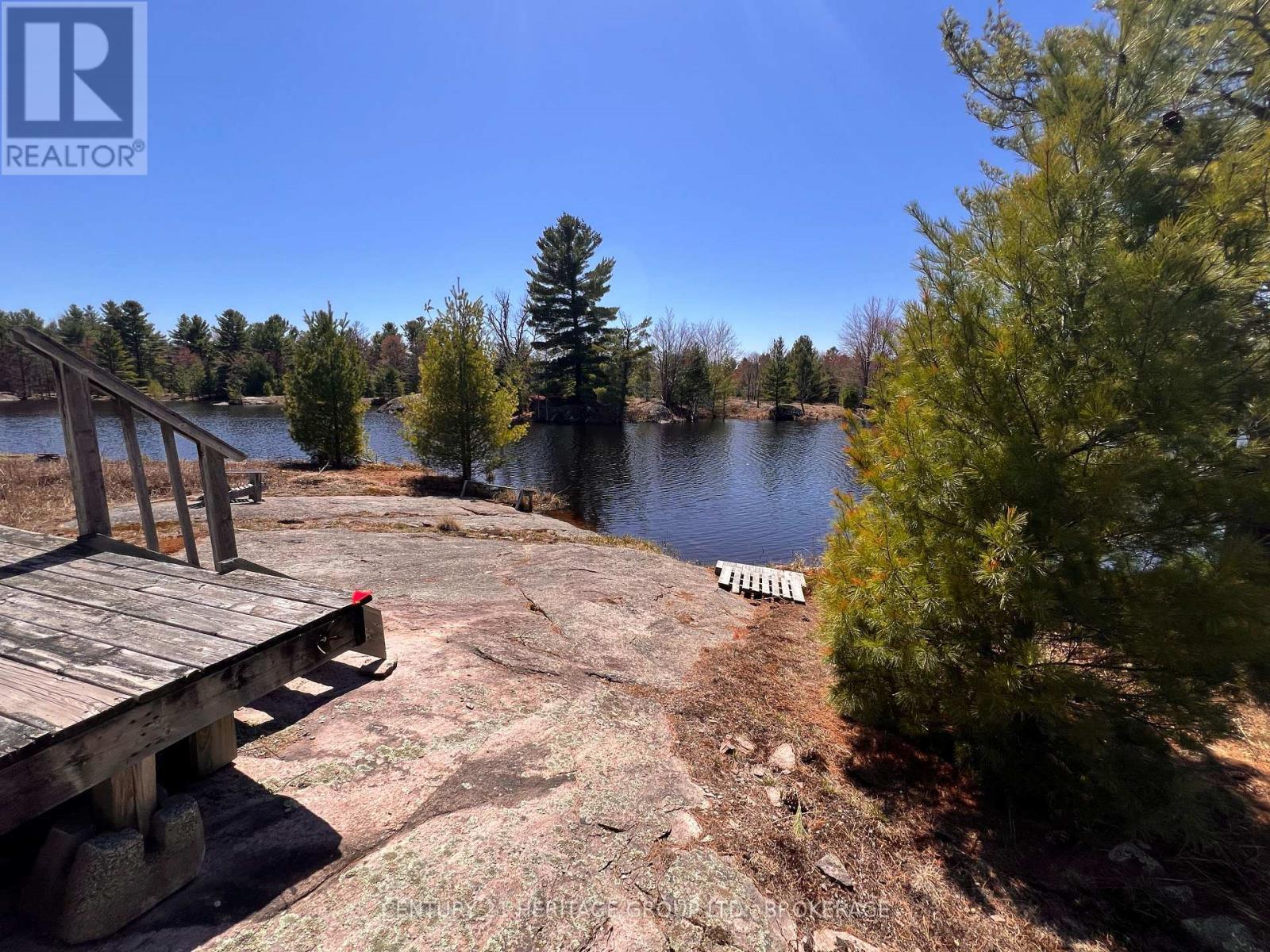 2355 Raymo Road, Frontenac (Frontenac Centre), ON - Outdoor With Body Of Water With View