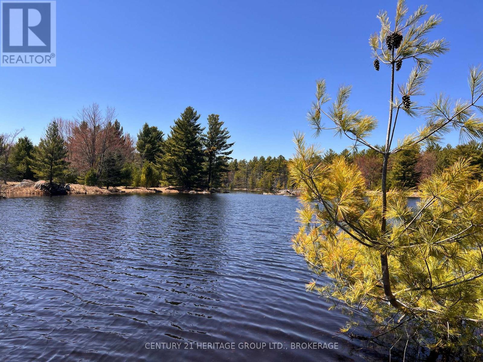 2355 Raymo Road, Frontenac (Frontenac Centre), ON - Outdoor With Body Of Water With View