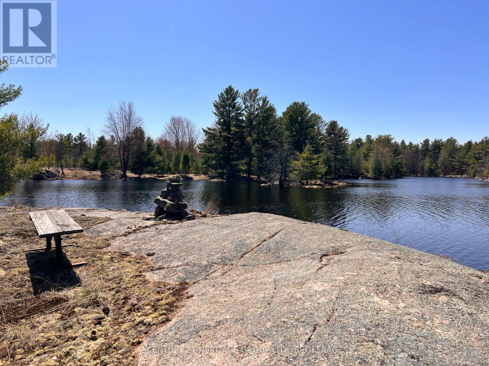 2355 Raymo Road, Frontenac (Frontenac Centre), ON - Outdoor With Body Of Water With View