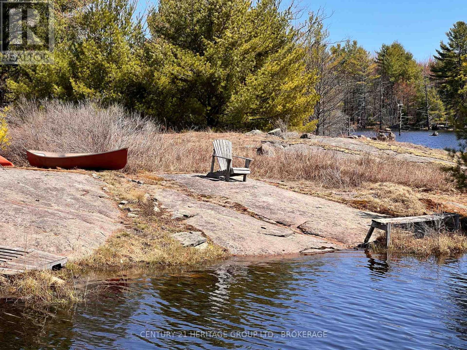 2355 Raymo Road, Frontenac (Frontenac Centre), ON - Outdoor With Body Of Water With View