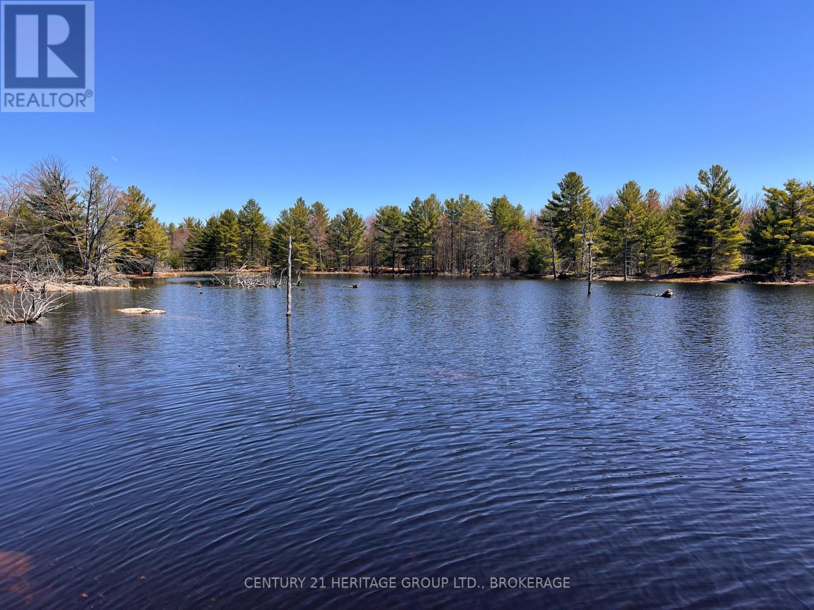 2355 Raymo Road, Frontenac (Frontenac Centre), ON - Outdoor With Body Of Water With View