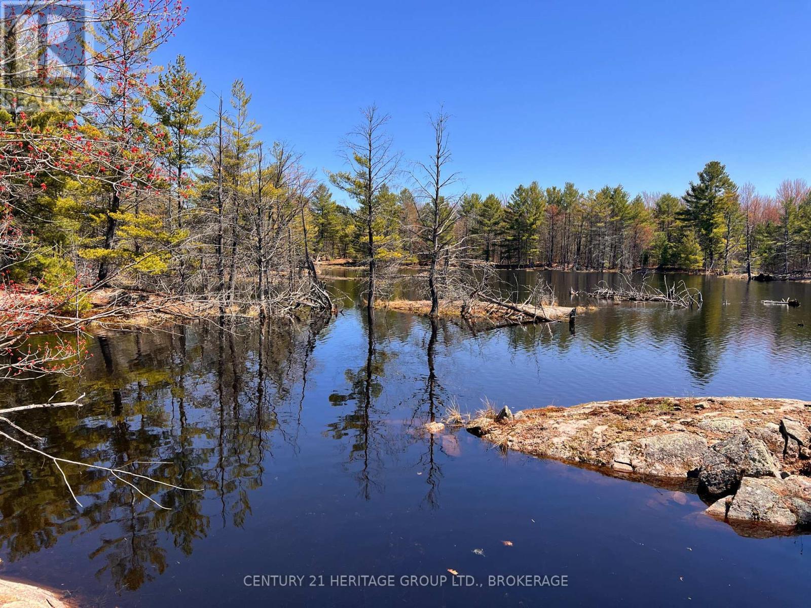 2355 Raymo Road, Frontenac (Frontenac Centre), ON - Outdoor With Body Of Water With View