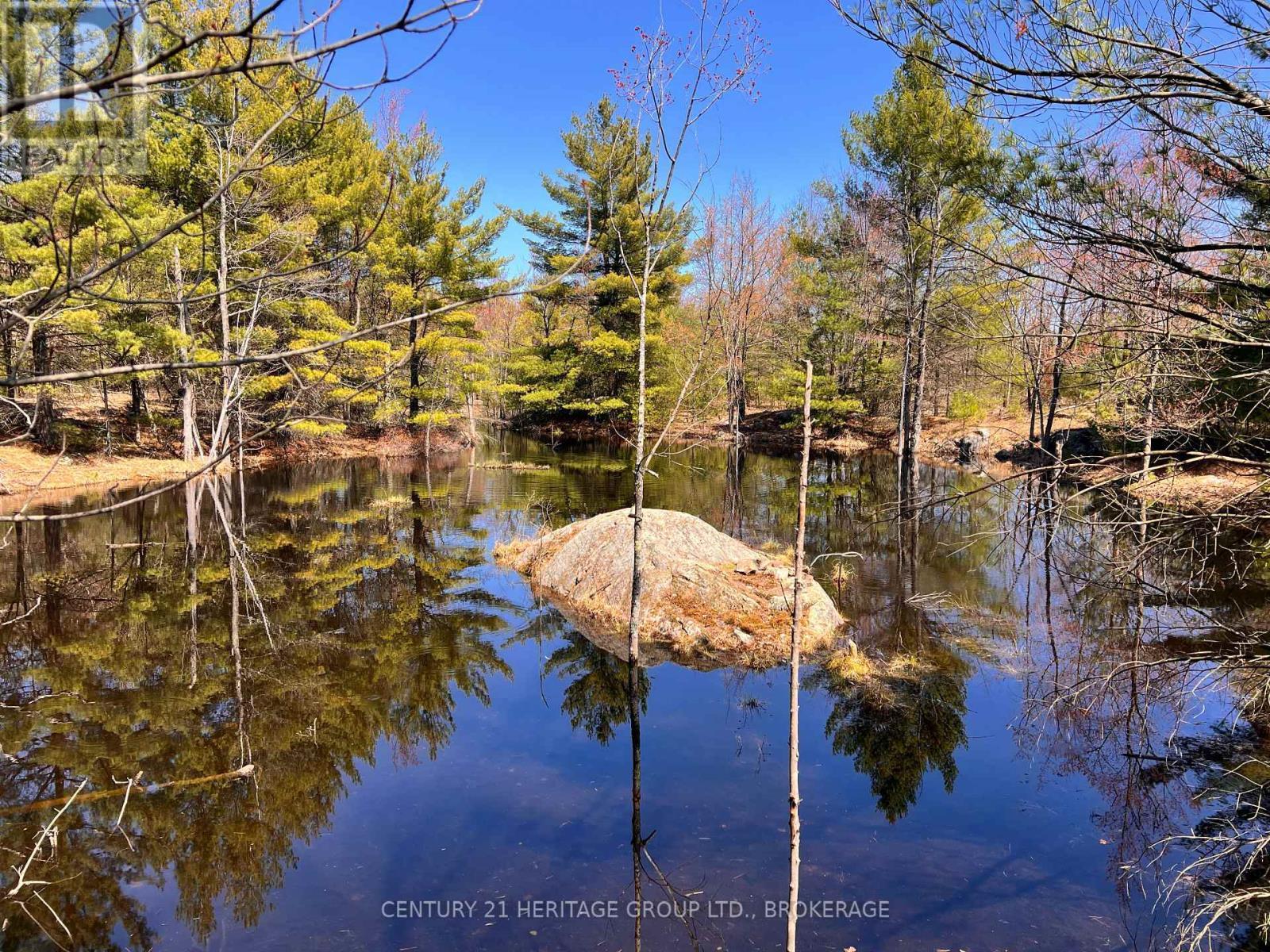 2355 Raymo Road, Frontenac (Frontenac Centre), ON - Outdoor With Body Of Water With View