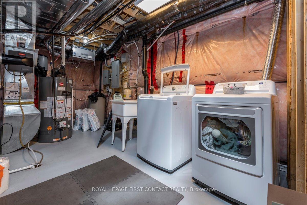 Laundry Area - 182 Banting Crescent, Essa, ON - Indoor Photo Showing Laundry Room