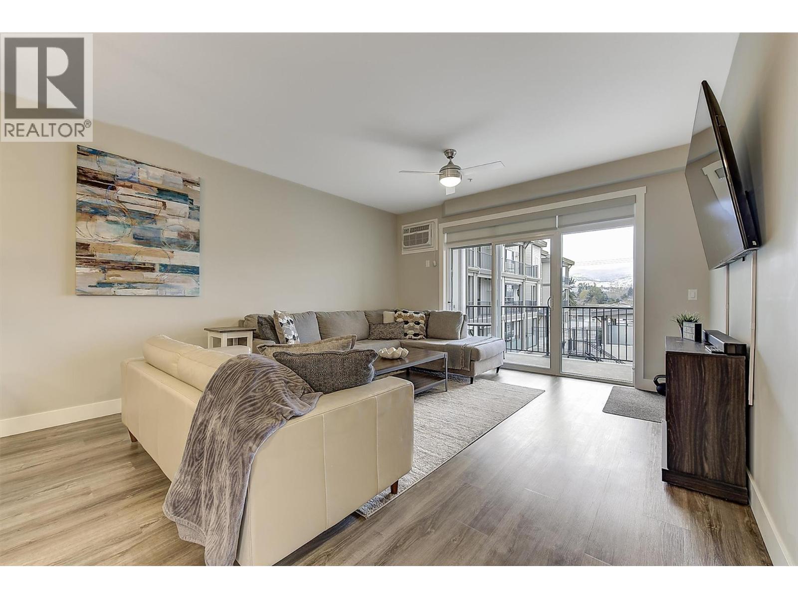 Lots of natural light coming in your south facing patio door - 3090 Burtch Road Unit# 201, Kelowna, BC - Indoor Photo Showing Kitchen