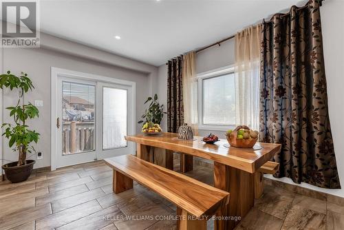 Eat in area of kitchen with Walk out to backyard - 847 West 5Th Street, Hamilton, ON - Indoor Photo Showing Other Room
