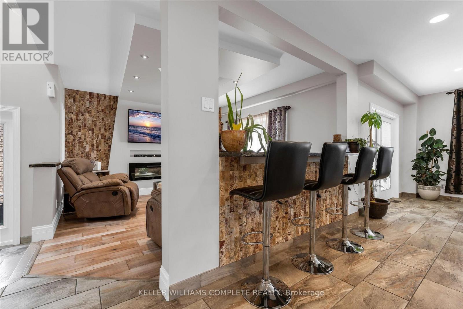 Bar overlooking lIving Room - 847 West 5Th Street, Hamilton, ON - Indoor With Fireplace