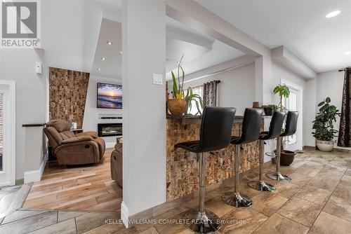 Bar overlooking lIving Room - 847 West 5Th Street, Hamilton, ON - Indoor With Fireplace