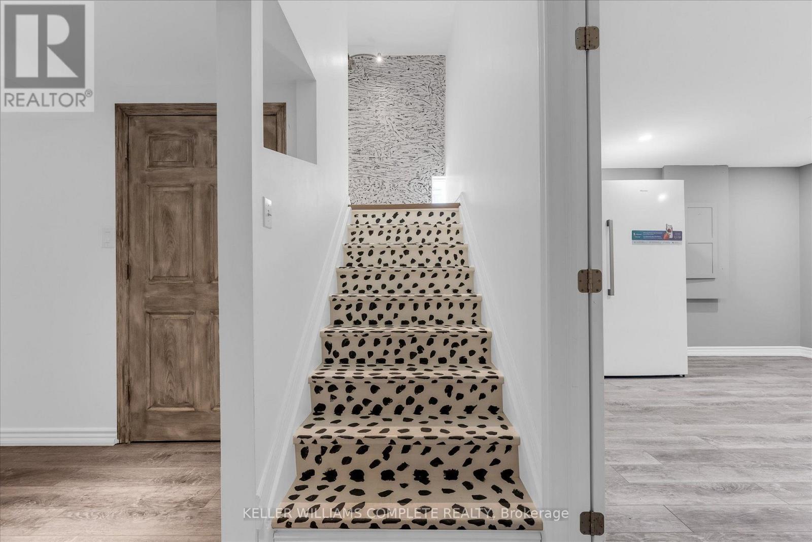 Stair to basement from main level - 847 West 5Th Street, Hamilton, ON - Indoor Photo Showing Other Room