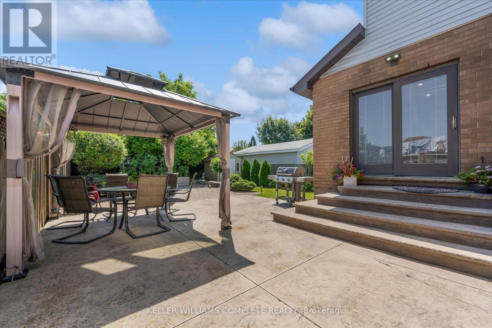 Rear entrance to patio and yard - 847 West 5Th Street, Hamilton, ON - Outdoor With Deck Patio Veranda