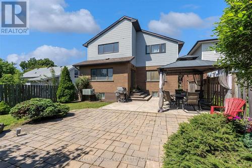 Backyard with concrete and interlocking patios - 847 West 5Th Street, Hamilton, ON - Outdoor With Deck Patio Veranda