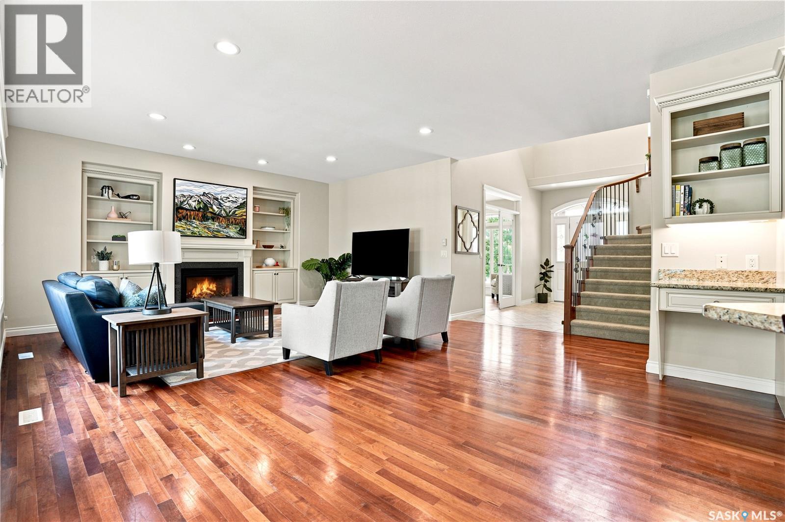 718 Brookhurst Lane, Saskatoon, SK - Indoor Photo Showing Living Room With Fireplace