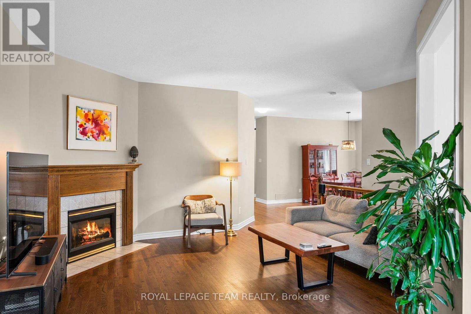 32 Trump Avenue, Ottawa, ON - Indoor Photo Showing Living Room With Fireplace