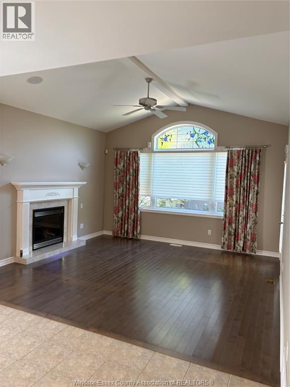 1465 Poisson, Tecumseh, ON - Indoor Photo Showing Living Room With Fireplace